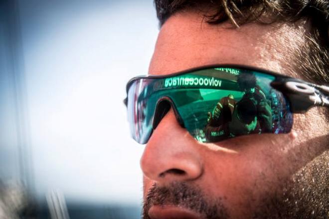 Onboard MAPFRE - A reflection of OBR, Francisco Vignale, in Carlos Hernandez' sunglasses - Leg 7 to Lisbon - Volvo Ocean Race &copy;  Francisco Vignale http://www.franciscovignale.com/